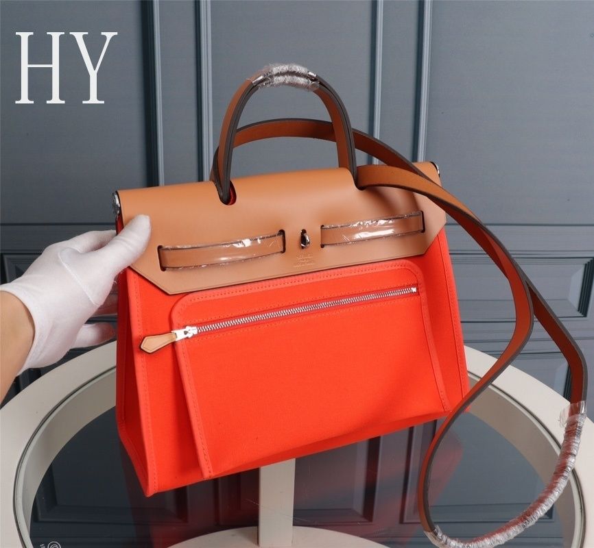 Hermes Orange Canvas and Natural Calfskin Leather Herbag Zip PM Bag 586085 Hermes Orange Canvas and Natural Calfskin Leather Herbag Zip PM Bag 586085