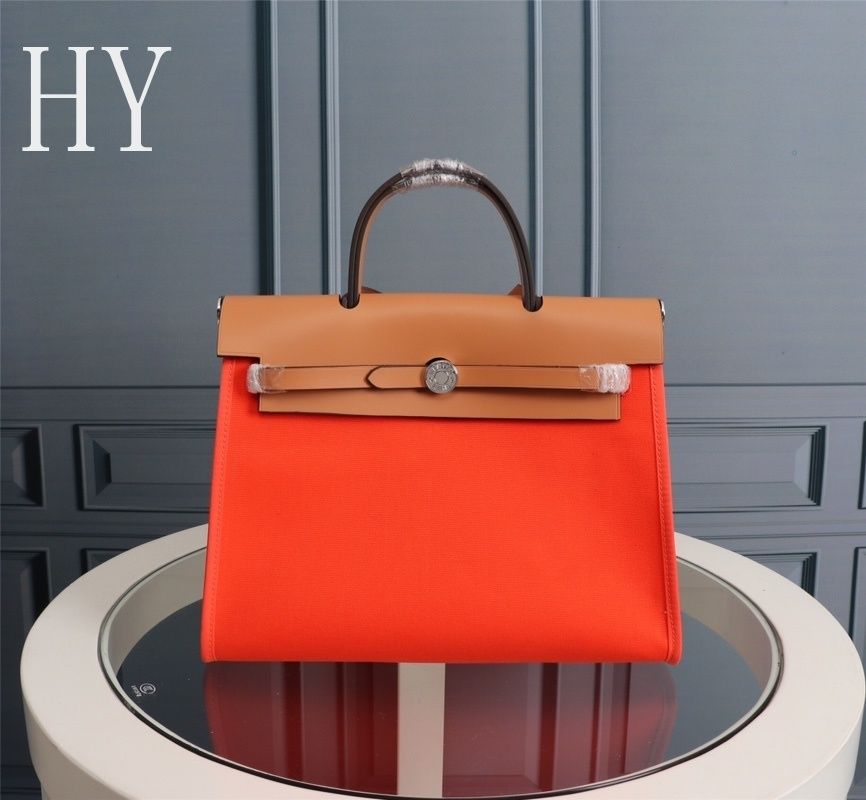 Hermes Orange Canvas and Natural Calfskin Leather Herbag Zip PM Bag 586085 Hermes Orange Canvas and Natural Calfskin Leather Herbag Zip PM Bag 586085