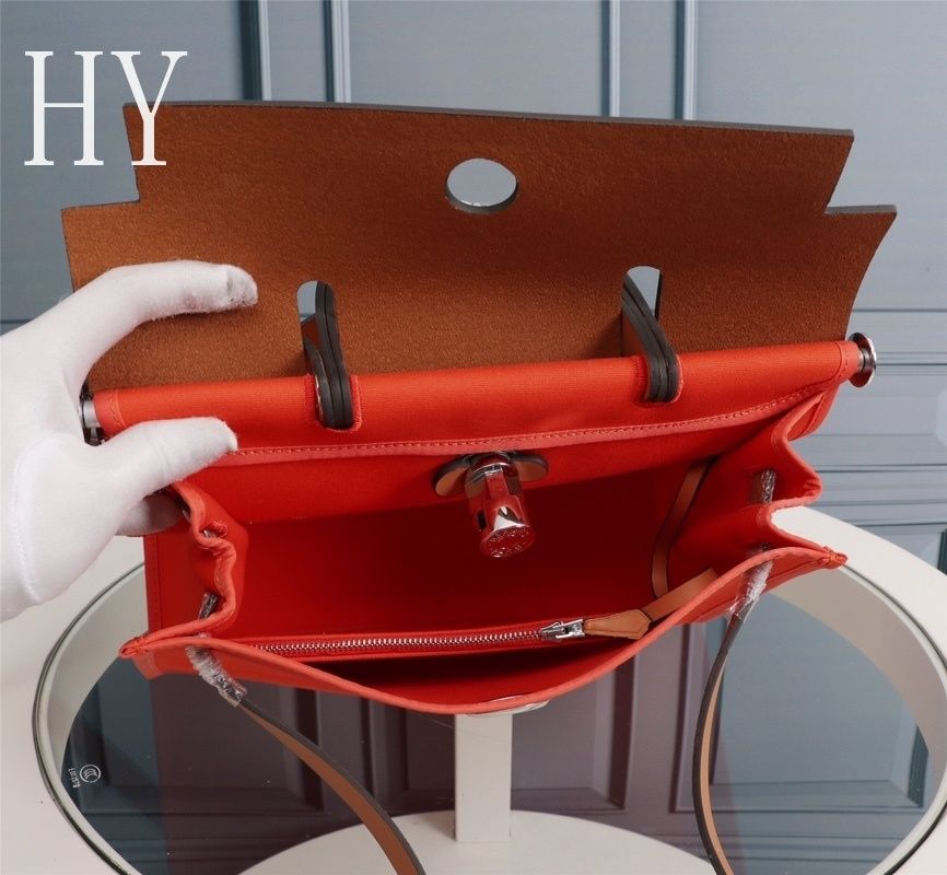 Hermes Orange Canvas and Natural Calfskin Leather Herbag Zip PM Bag 586085 Hermes Orange Canvas and Natural Calfskin Leather Herbag Zip PM Bag 586085