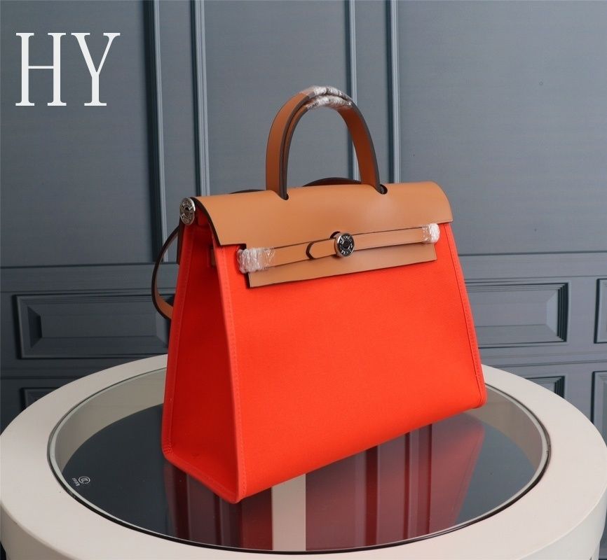 Hermes Orange Canvas and Natural Calfskin Leather Herbag Zip PM Bag 586085 Hermes Orange Canvas and Natural Calfskin Leather Herbag Zip PM Bag 586085