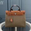 Hermes Brown Canvas and Natural Calfskin Leather Herbag Zip PM Bag 586085-1 Hermes Brown Canvas and Natural Calfskin Leather Herbag Zip PM Bag 586085-1