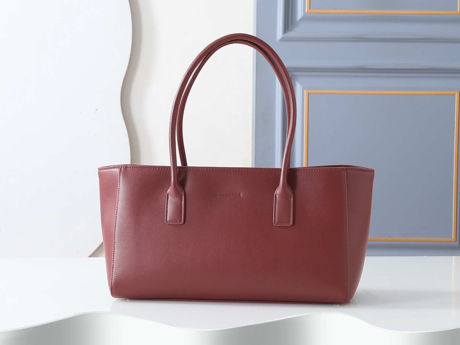 CN Spring Summer 2026 Small Shopping Bag in Dark Burgundy CN Spring Summer 2026 Small Shopping Bag in Dark Burgundy