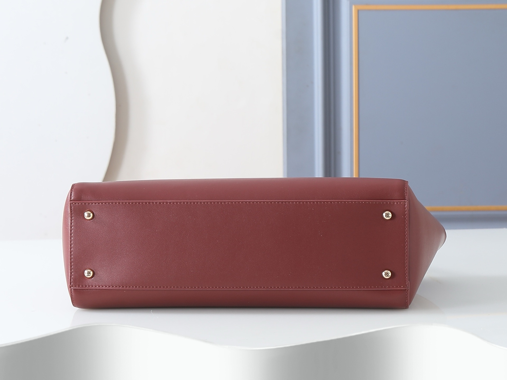 CN Spring Summer 2026 Small Shopping Bag in Dark Burgundy CN Spring Summer 2026 Small Shopping Bag in Dark Burgundy