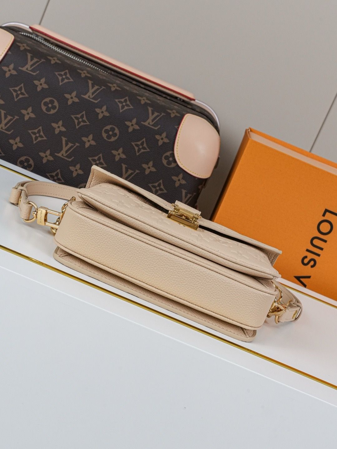 LV Pochette Métis East West Monogram Empreinte Leather Bag KK03850 LV Pochette Métis East West Monogram Empreinte Leather Bag KK03850
