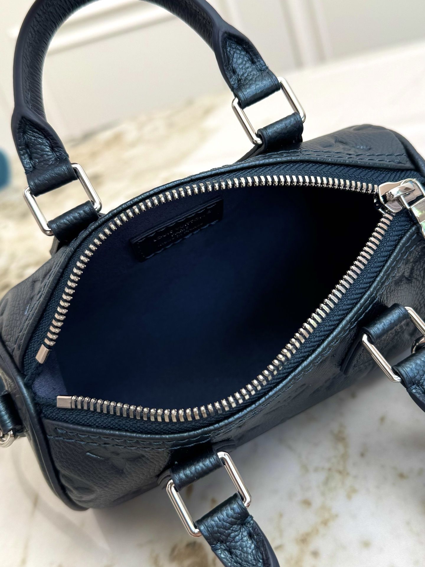 LV Nano Speedy Monogram Empreinte Leather Bag – Deep Blue DMB3204250 LV Nano Speedy Monogram Empreinte Leather Bag – Deep Blue DMB3204250